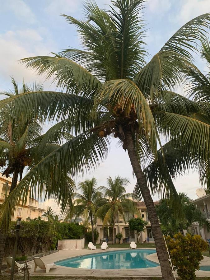 Escale Vacances Flic en Flac Bagian luar foto
